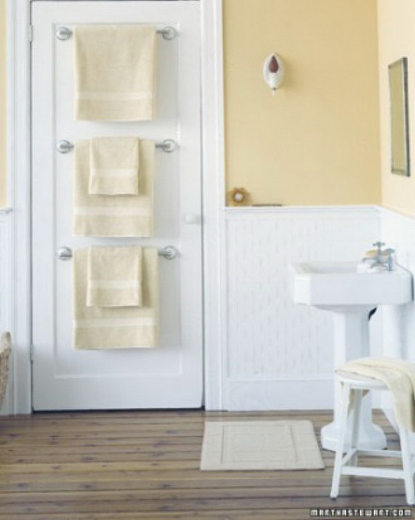 Hang Towel Holders Behind Bathroom Door For More Storage Space. 