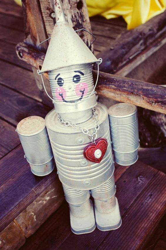 Add Color and Joy to Your Garden with This Tin Can Man. 