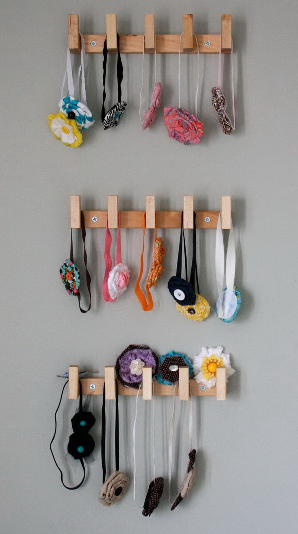 Use Wall-Mounted Rack To Keep Headbands Separated By Size