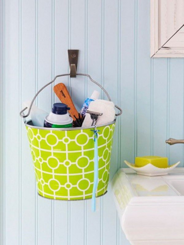 Colorful metal buckets hanging on the wall would be cute in a kids’ bathroom