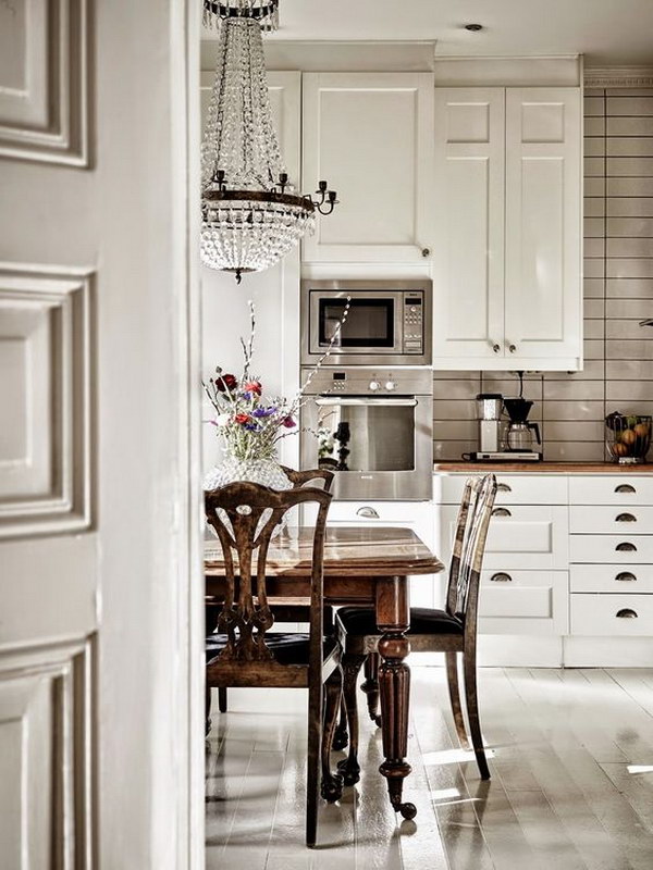 Cool Feminine Chic Kitchen with Wood Countertops. 