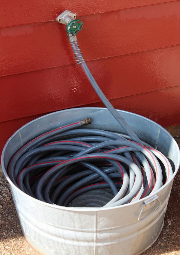 Farmhouse Hose Holder with Silver Bucket. 