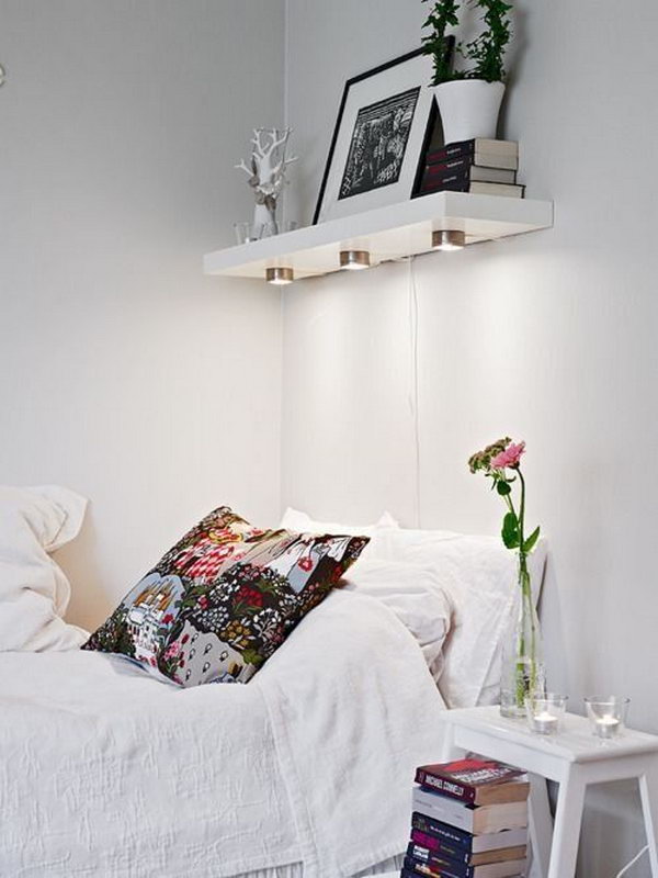 It's a clever idea to use your headboard for extra storage space.