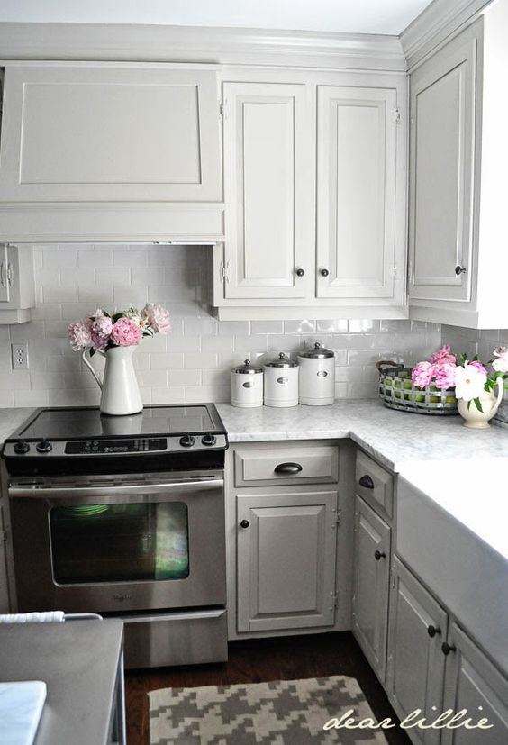 Light Gray Painted Kitchen Cabinets. 