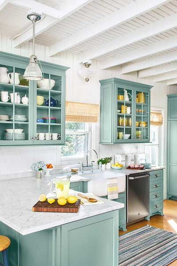 Stratton Blue Kitchen Cabinets with Marble Countertops. 