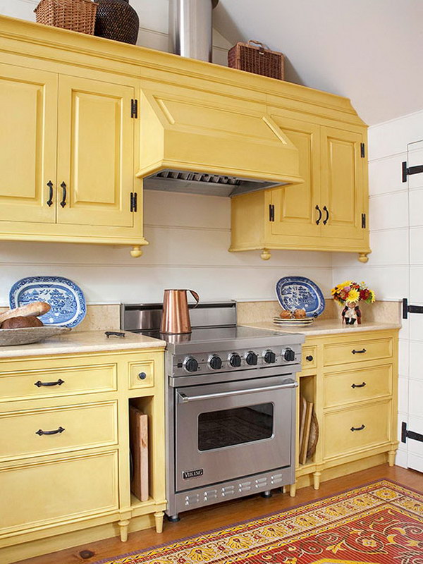 White Kitchen With Yellow Cabinets. 