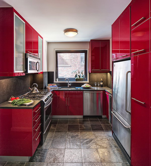 Contemporary U-shaped Enclosed Kitchen with Flat-panel Red Cabinets. 