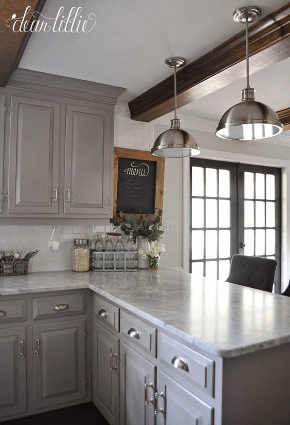 Gray Kitchen Cabinets with White Subway Tile Backsplash. 