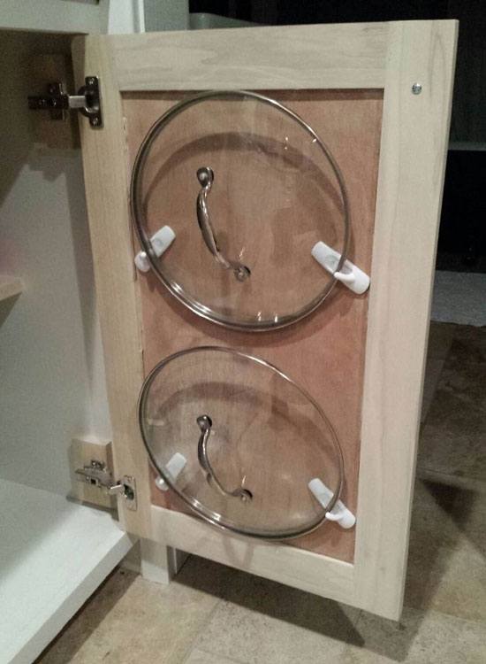 Use Command Hooks as Pot Lid Holders. 