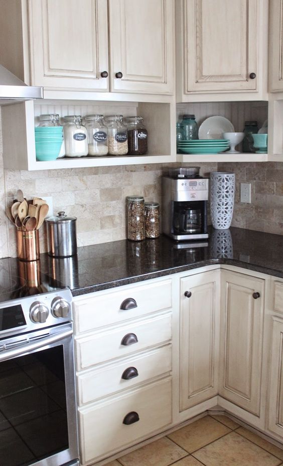 Raised Wall Cabinets With Shelves Built Underneath. 