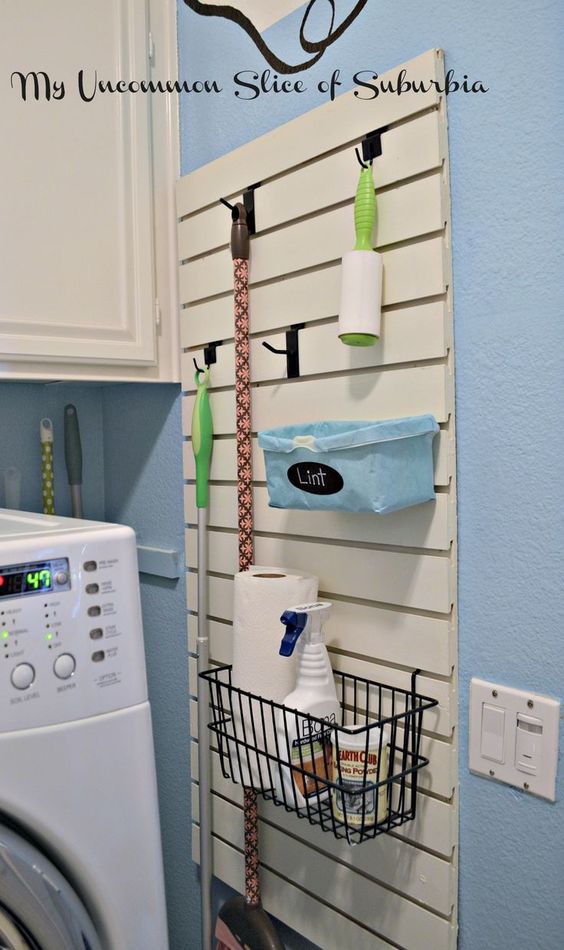 Organize Laundry Room Using Slatwall. 