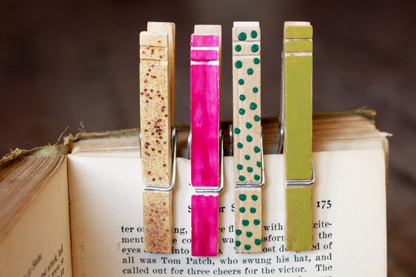 Use nail polish to paint some wood clothes pins. 