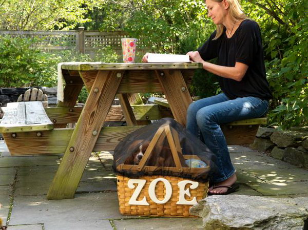 Make a Travel Pet Bed Out of a Picnic Basket. 