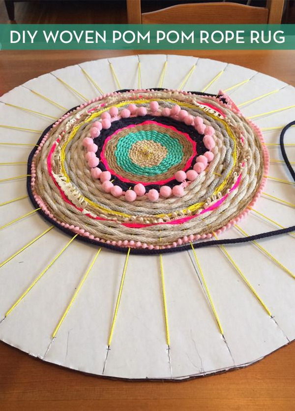 Woven Rug using a Cardboard Loom. Detailed tutorial on how to make a pretty rug from old t-shirts, on a cardboard loom or hula hoop loom! 