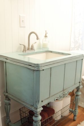 A Repurposed Sewing Machine Cabinet Is Now A Shabby Chic Bathroom Vanity. 