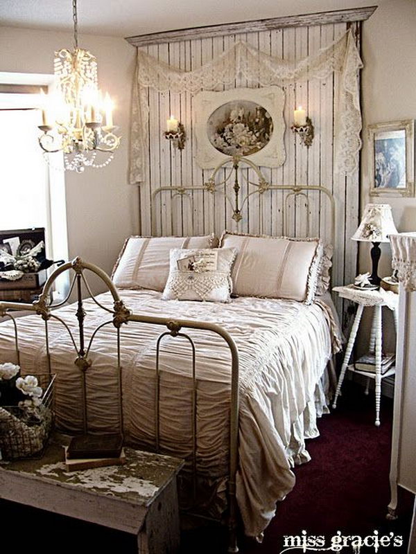 This is an example of a romantic shabby-chic style bedroom with the chandelier and the beadboard panel behind the bed. 