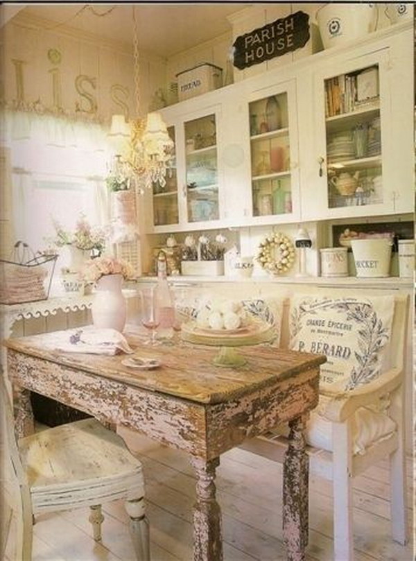 Shabby Chic Eat-in Kitchen with a Rustic Wood Dinning Table. 