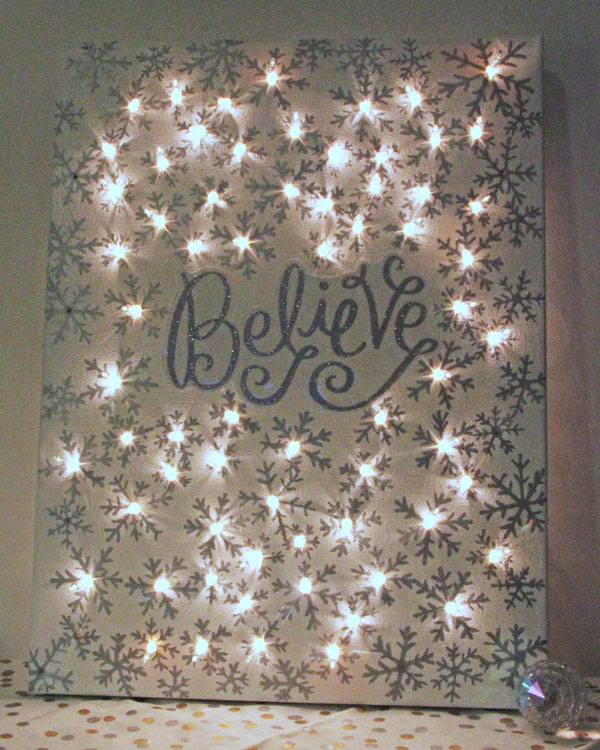 DIY Illuminated Canvas Using Sharpies and String Lights. 