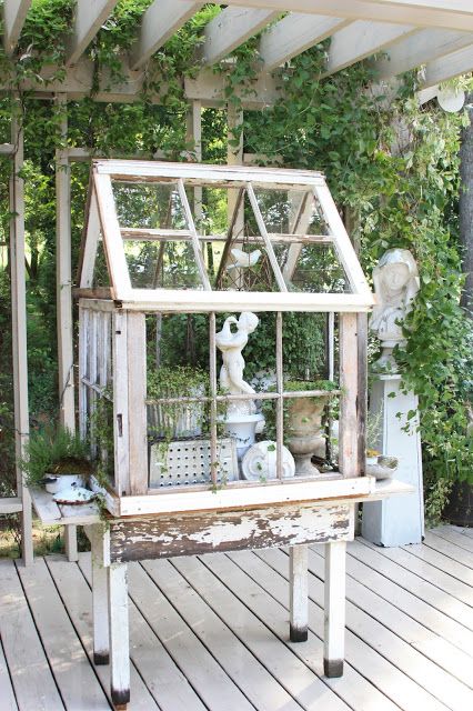 DIY Greenhouse Made Out of Old Windows. 