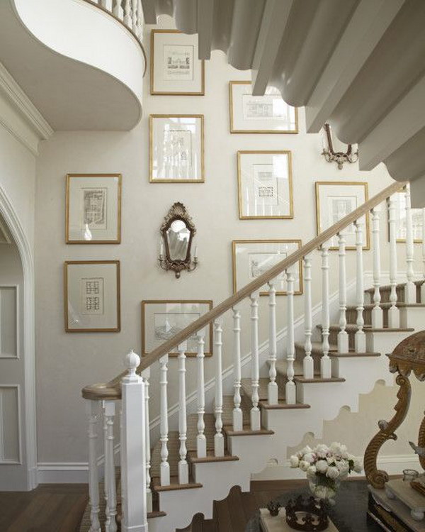 elegant and beautiful way to place prints on wall going up the stairs. 