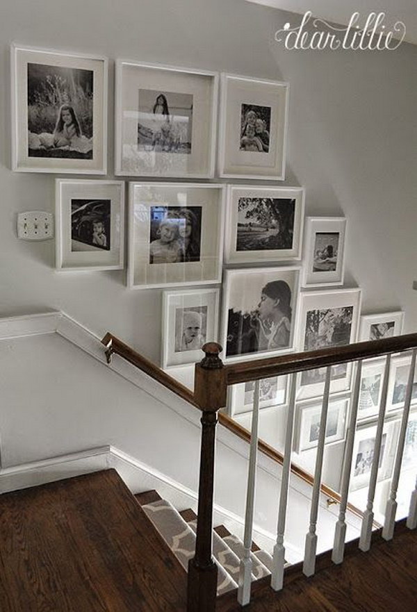 Create a gallery wall filled with all sorts of family photos. It's a great idea being able to look at all the photographs and see so many different memories every time you climbed the stairs. 
