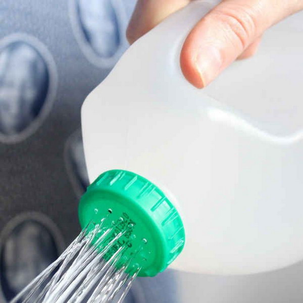 Make a Watering Can out of a Gallon Jug. 