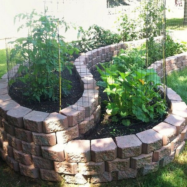 Beautiful Curved Raised Bed Garden Using Landscape Stones. 