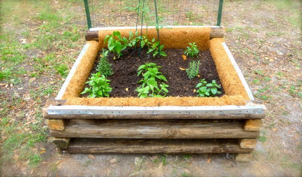 DIY Raised Garden Bed With Weed Cloth And Coconut Fiber To Line The Inside Of The Box. 