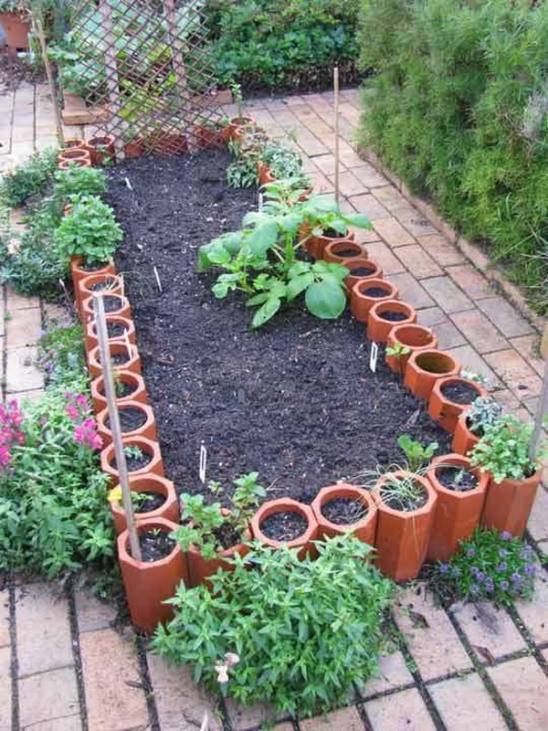 DIY Raised Garden Beds from Old Terracotta Pipes. 
