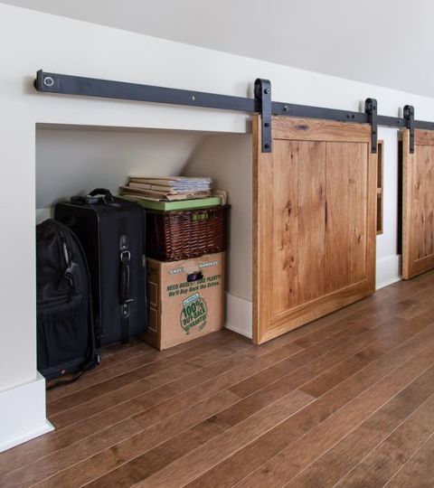 Add Sliding Barn Doors to Cover Knee Wall Storage. 