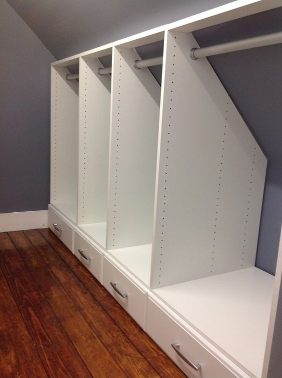 Build a Built In Closet with Hanging Rods and Storage on Bottom. 