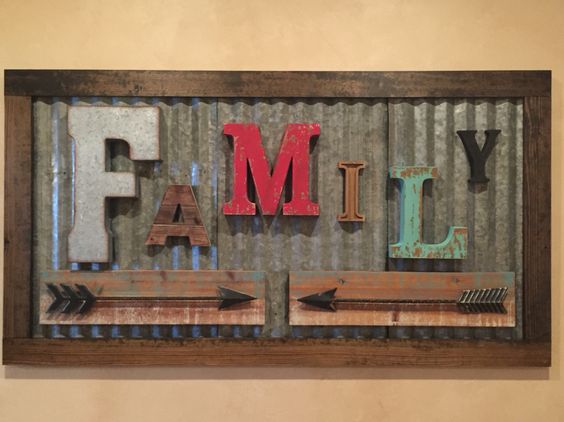 Rustic Family Sign Made from Vintage Letters and Old Corrugated Metal. 