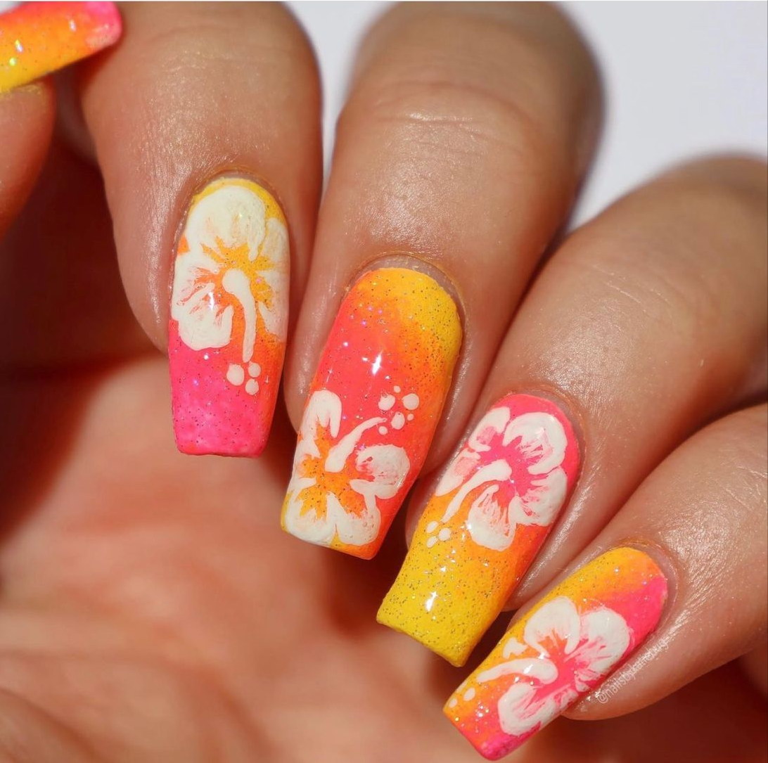 Red and Orange Nails with White Flowers. 