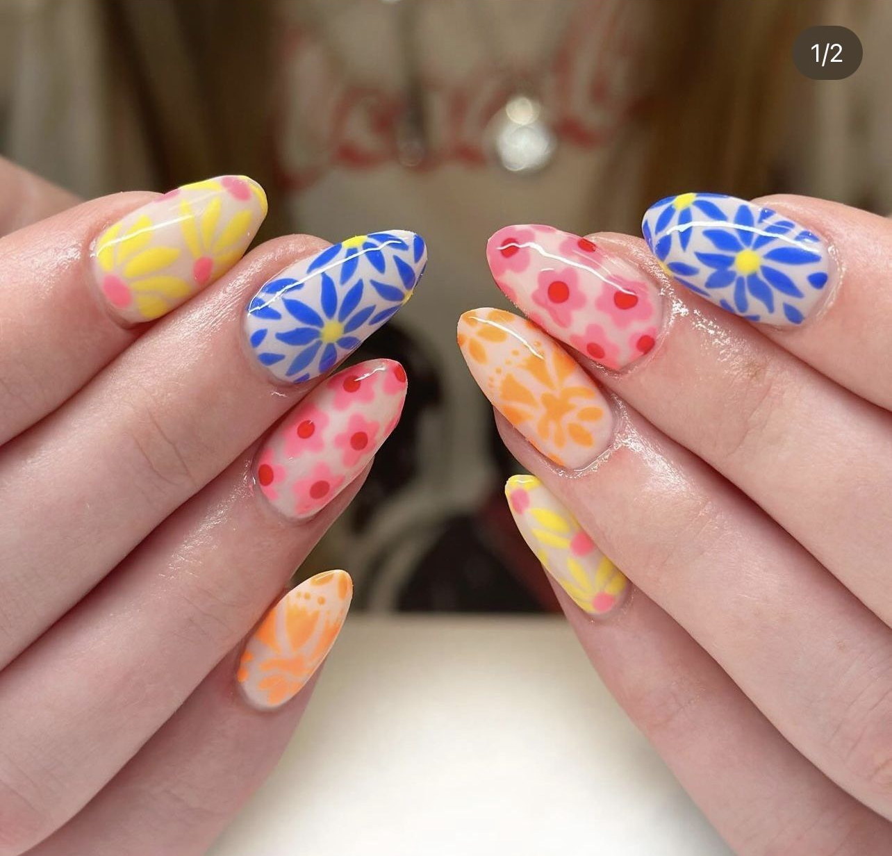 Blue Pink and Yellow Flower Nails. 